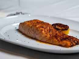 The Grill on Main St signature dishes Short Rib Beef StroganoffMaple Glazed SalmonAll-Natural Chicken Parmigiana